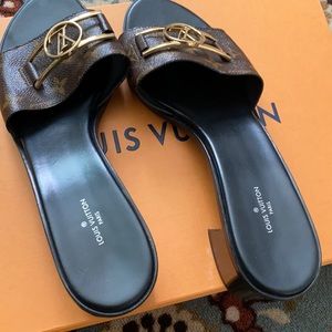 Patent monogram leather sole.